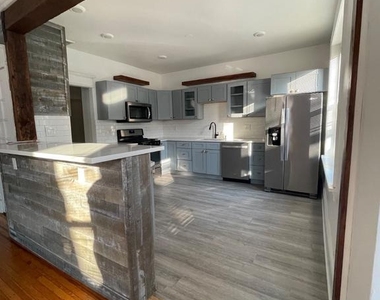 114 Levering Street - Photo Thumbnail 3