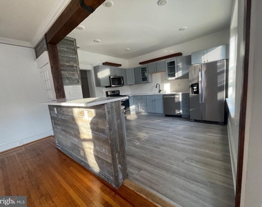 114 Levering Street - Photo Thumbnail 2