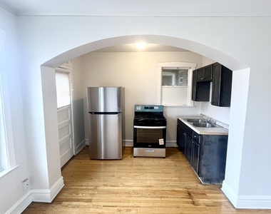 5042 W 21st Place - Photo Thumbnail 2