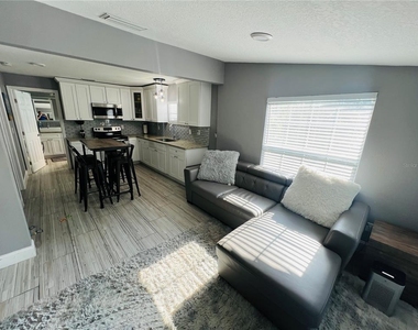 7301 N Dixon Avenue - Photo Thumbnail 2