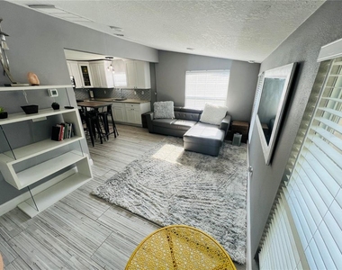 7301 N Dixon Avenue - Photo Thumbnail 1