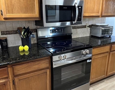 9433 Harbor Greens Way - Photo Thumbnail 3