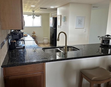 9433 Harbor Greens Way - Photo Thumbnail 16