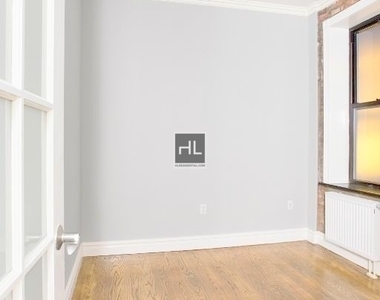 E 13th St. - Photo Thumbnail 2