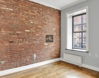 E 13th St. - Photo Thumbnail 3