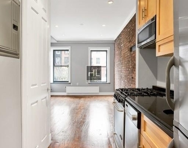 E 13th St. - Photo Thumbnail 1