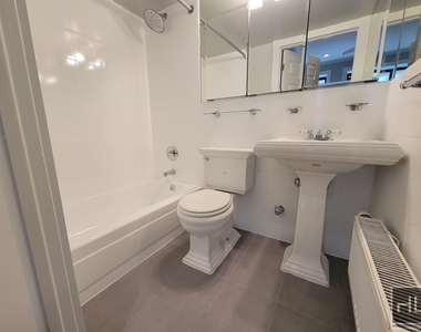 E 13th St. - Photo Thumbnail 4