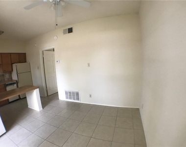 619 W 37th St - Photo Thumbnail 2