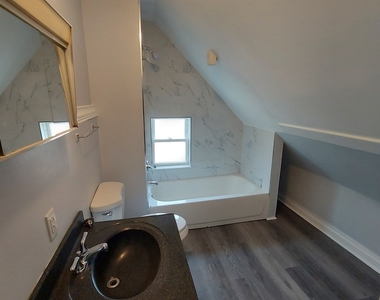 1009 Garnett Place - Photo Thumbnail 2