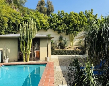 1555 Rising Glen Road - Photo Thumbnail 2