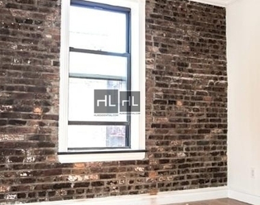 E 13th St. - Photo Thumbnail 3