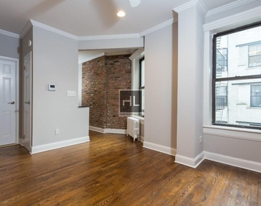 E 13th St. - Photo Thumbnail 1