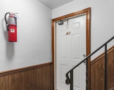 8030 Ditman Street - Photo Thumbnail 2