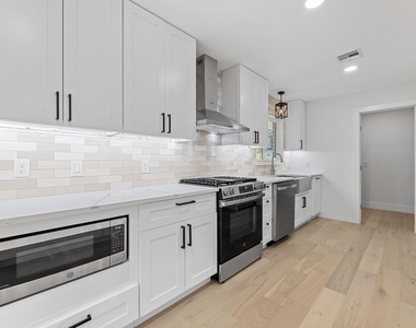 12315 Barryknoll Lane - Photo Thumbnail 2