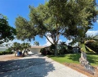 6901 Gulf Winds Drive - Photo Thumbnail 2