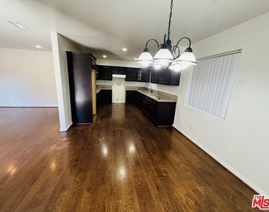 8820 Orchard Avenue - Photo Thumbnail 2