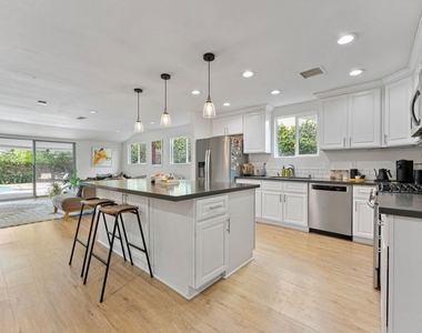 5211 Allott Avenue - Photo Thumbnail 5