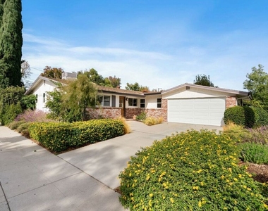5211 Allott Avenue - Photo Thumbnail 1