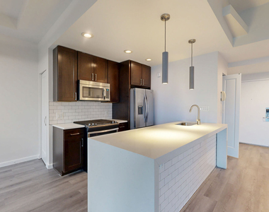 401 E 34th St - Photo Thumbnail 1