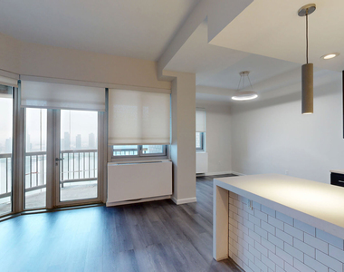 401 E 34th St - Photo Thumbnail 2