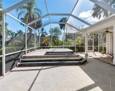 10002 Hunt Cliff Drive - Photo Thumbnail 2