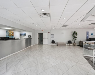 151 E Washington Street - Photo Thumbnail 2