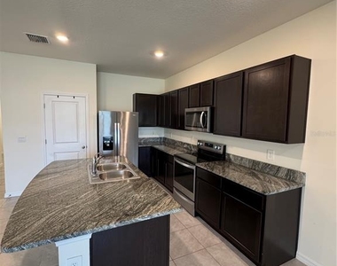 8809 Milestone Drive - Photo Thumbnail 12