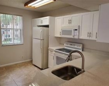8871 Wiles Road - Photo Thumbnail 4