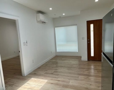 233 N Berendo Street - Photo Thumbnail 2