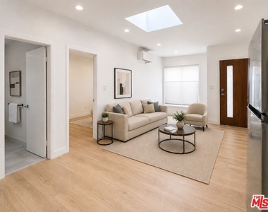 233 N Berendo Street - Photo Thumbnail 3