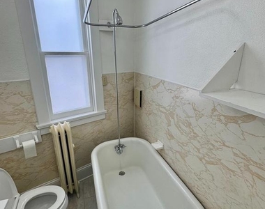 112 E 3rd Street - Photo Thumbnail 25