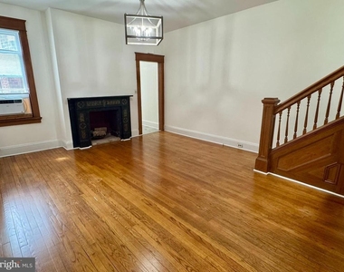 112 E 3rd Street - Photo Thumbnail 4