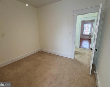 112 E 3rd Street - Photo Thumbnail 16