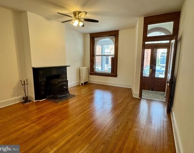 112 E 3rd Street - Photo Thumbnail 2