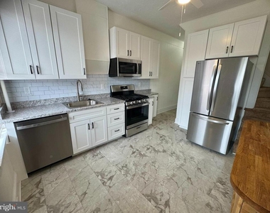 112 E 3rd Street - Photo Thumbnail 10