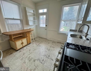 112 E 3rd Street - Photo Thumbnail 9