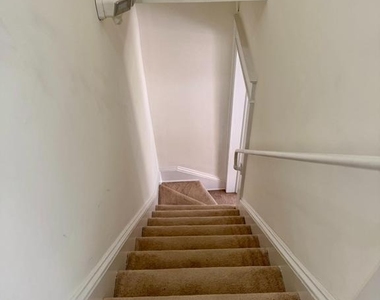 112 E 3rd Street - Photo Thumbnail 18