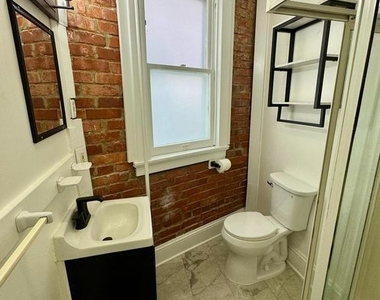 112 E 3rd Street - Photo Thumbnail 7