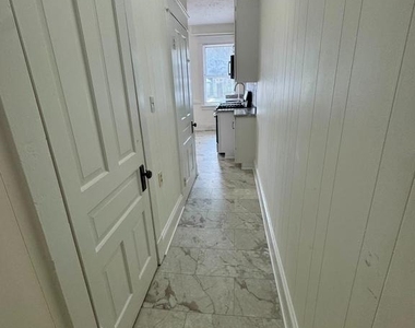 112 E 3rd Street - Photo Thumbnail 8