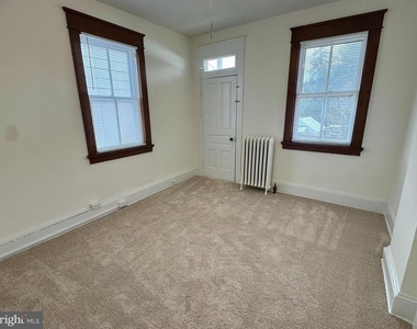 112 E 3rd Street - Photo Thumbnail 19