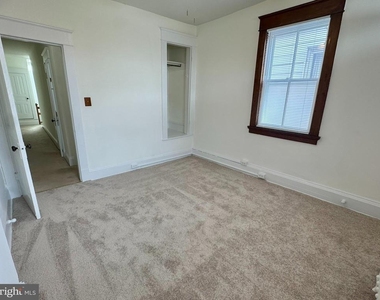 112 E 3rd Street - Photo Thumbnail 20