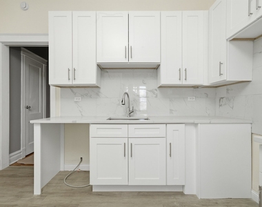 7442 S Langley Avenue - Photo Thumbnail 4