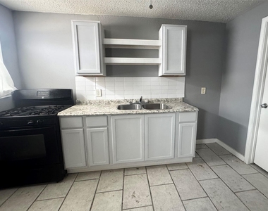 7018 1/2 Avenue F - Photo Thumbnail 2