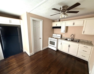 7018 Avenue F - Photo Thumbnail 2