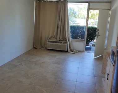 7900 S Orange Blossom Trail - Photo Thumbnail 2