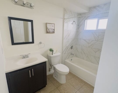10605 Avalon Boulevard - Photo Thumbnail 17