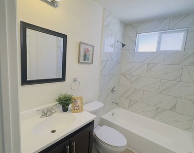 10605 Avalon Boulevard - Photo Thumbnail 22