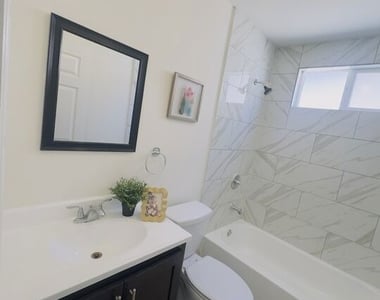 10605 Avalon Boulevard - Photo Thumbnail 21