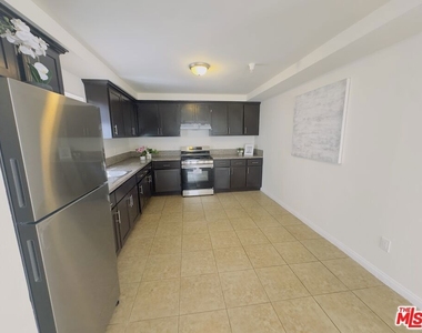 10605 Avalon Boulevard - Photo Thumbnail 13