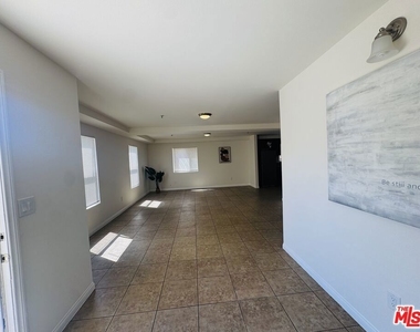 10605 Avalon Boulevard - Photo Thumbnail 5